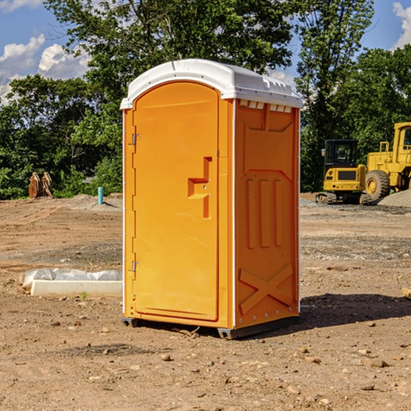 what is the cost difference between standard and deluxe portable toilet rentals in Mount Auburn